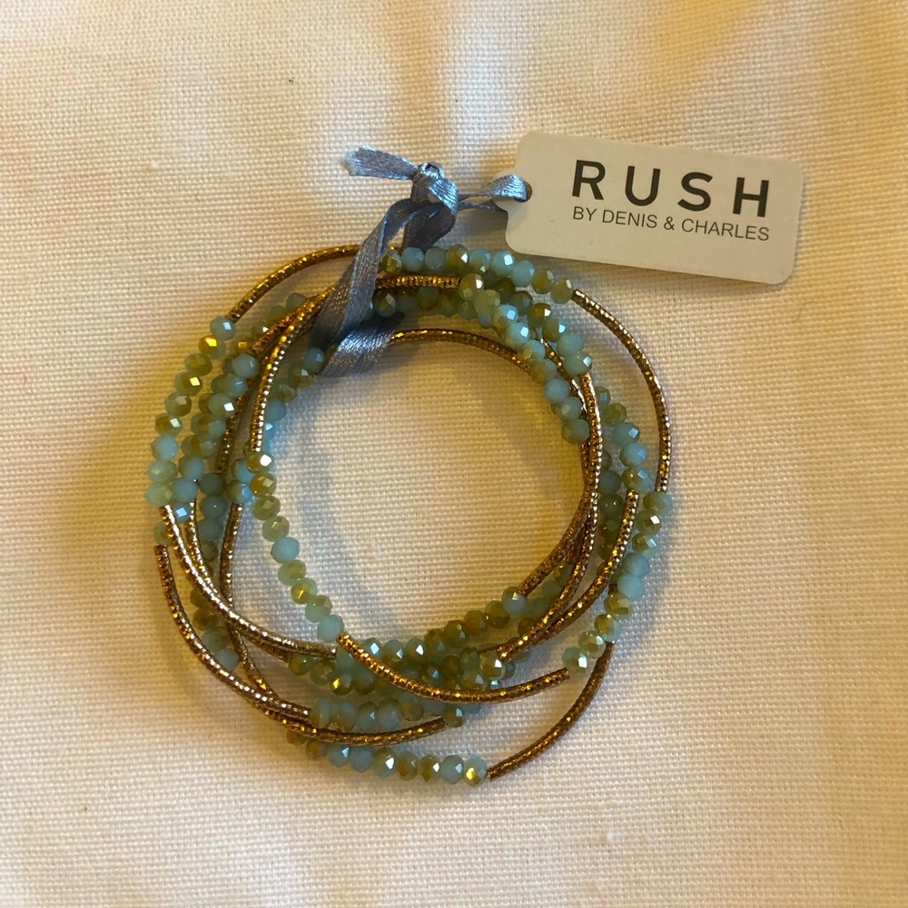Bracelet powder blue and gold beaded.